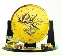 Фото золотой монеты Канады